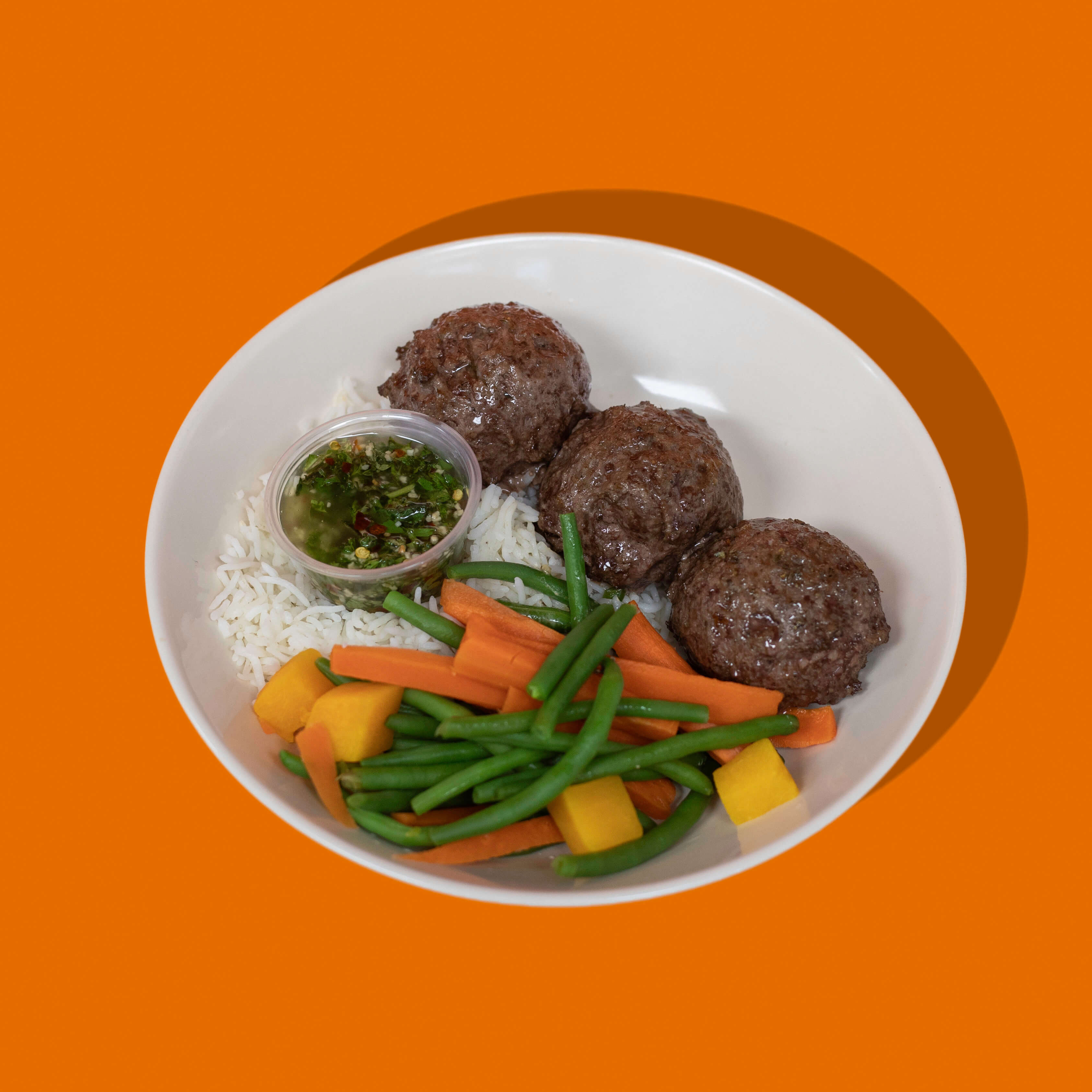 Repas prêt-à-manger Big Mig – Boulettes de bœuf au chimichurri, tendres et savoureuses, parfaites pour optimiser ta récupération et ton alimentation quotidienne.