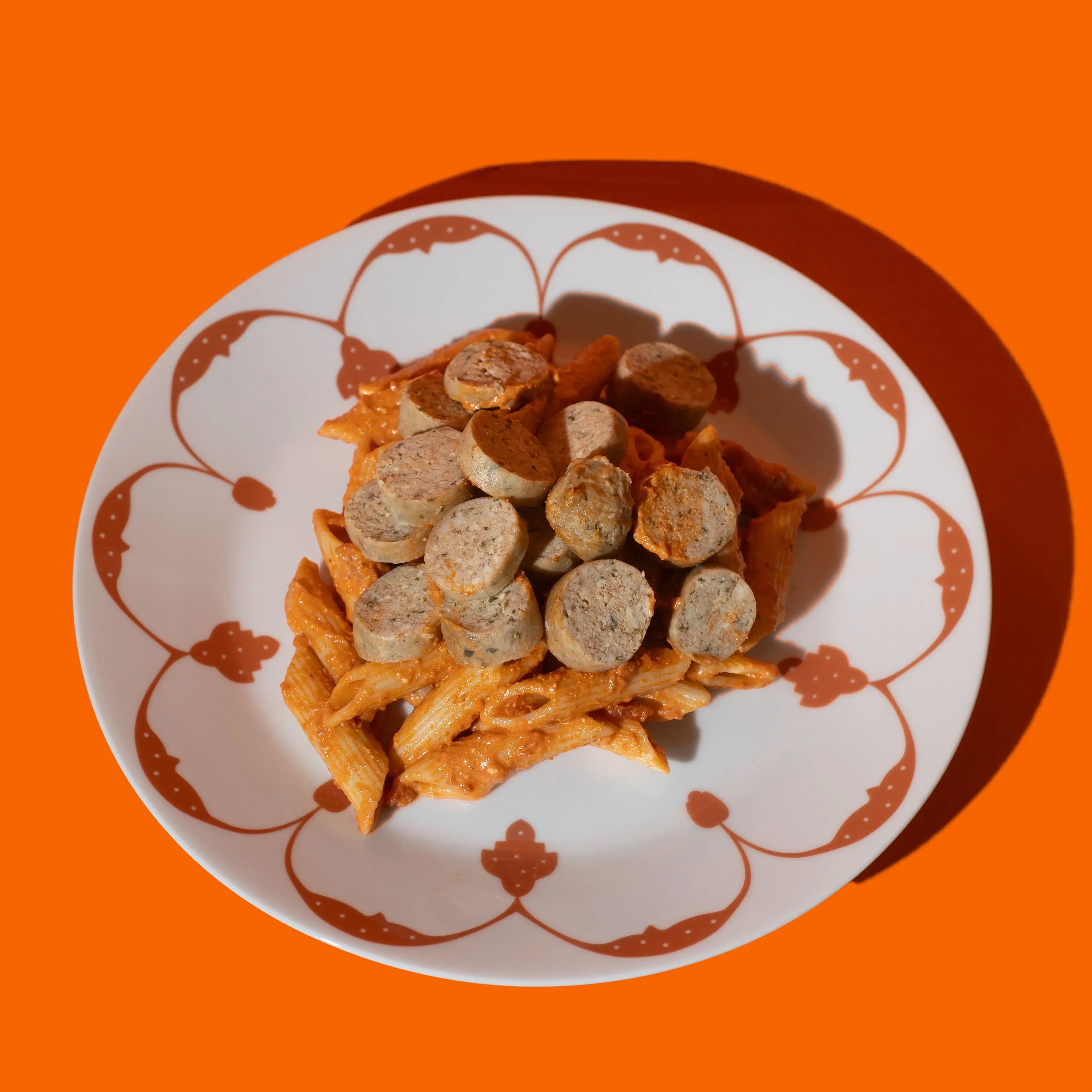 Penne sauce rosée et saucisses de poulet